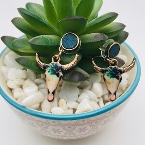 Gold Dipped Horn Floral Skull Earrings